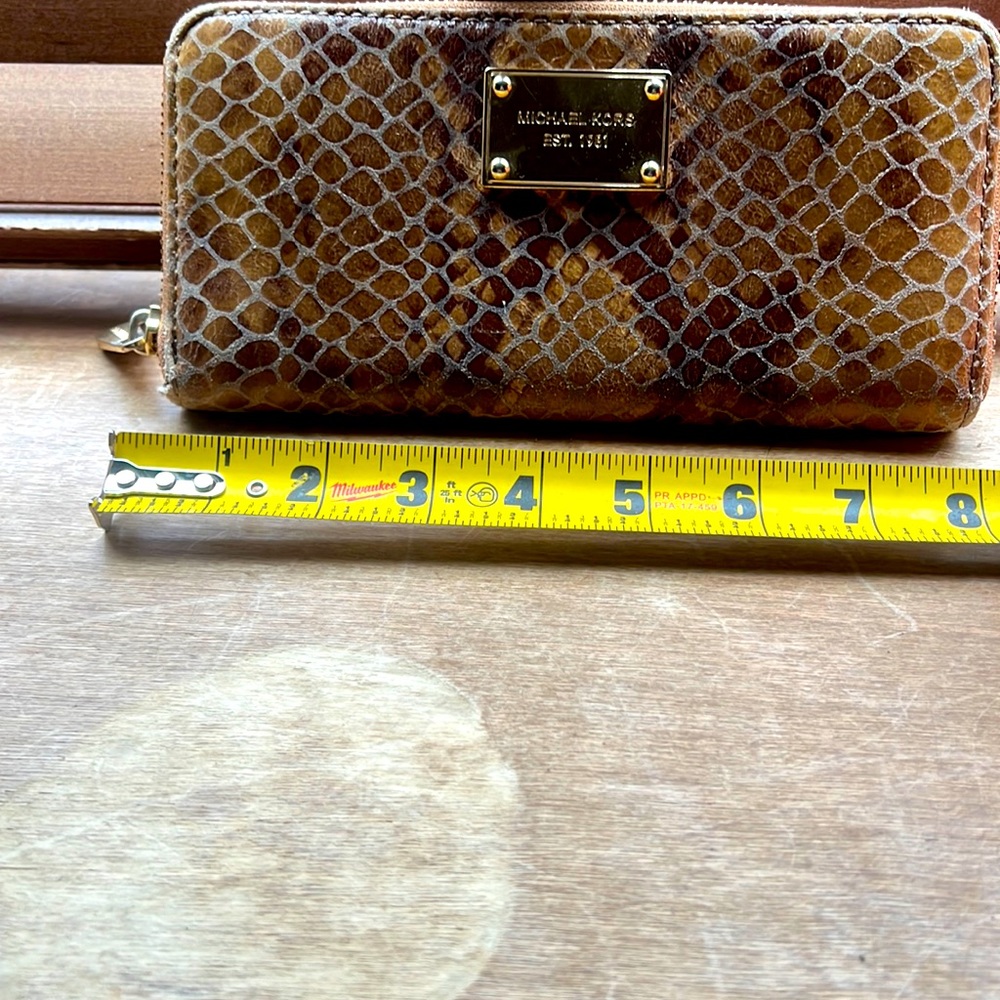Michael kors snake skin zip around wallet. Used but good condition